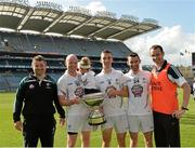 7 June 2014; Kildare backroom staff, Dermot Coulston, left, statsman, and Tom O'Meara, selector, right, with players, Richie Hoban, with his daughter Lucy, Martin Fitzgerald, Peter Coleman, all from Ardclough GAA club. Christy Ring Cup Final, Kerry v Kildare, Croke Park, Dublin. Picture credit: Piaras Ó Mídheach / SPORTSFILE