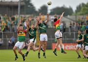 15 June 2014; Andrew Tormey, second from right, Meath, with support from team-mate Adam Flanagan, in action against Willie Minchin, left, and Michael Meaney, Carlow. Leinster GAA Football Senior Championship, Carlow v Meath, Dr. Cullen Park, Carlow. Picture credit: Barry Cregg / SPORTSFILE