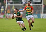 15 June 2014; Damien Carroll, Meath, in action against Eoghan Ruth, Carlow. Leinster GAA Football Senior Championship, Carlow v Meath, Dr. Cullen Park, Carlow. Picture credit: Barry Cregg / SPORTSFILE