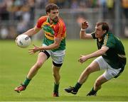 15 June 2014; Michael Meaney, Carlow, in action against Caolan Young, Meath. Leinster GAA Football Senior Championship, Carlow v Meath, Dr. Cullen Park, Carlow. Picture credit: Barry Cregg / SPORTSFILE