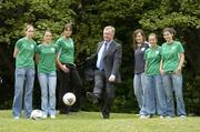 14 June 2006; Minister for the Arts, Sports and Tourism John O'Donoghue TD, shows off his soccer skills to Republic of Ireland Women Internationals left to right, Stephaine Roche, Aine O'Gorman, Grace Murray, Michelle Byrne, Noelle Murray and Tara McMahon, at the launch of the FAI Women's Development Plan. The Women's Development Plan is designed to increase the number of female participants, including players, coaches, referees and administrators and for the development of female players under the leadership of the FAI / WFAI from 2006-2010. Archbishop Ryan Park, Merrion Square, Dublin. Picture credit: David Maher / SPORTSFILE