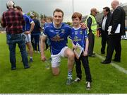 29 May 2016; Eight year old Cavan supporter Jack Whitney along with Cavan captain Gearoid McKiernan after the Ulster GAA Football Senior Championship quarter-final between Cavan and Armagh at Kingspan Breffni Park, Cavan. Photo by Oliver McVeigh/Sportsfile