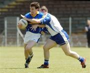 17 June 2006; David Barden, Longford, in action against Shane Briggs, Waterford. Bank of Ireland All-Ireland Senior Football Championship Qualifier, Round 1, Waterford v Longford, Walsh Park, Waterford. Picture credit: Damien Eagers / SPORTSFILE