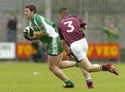 18 June 2006; Stuart McKenzie-Smith, London, in action against Brendan Nannery, Westmeath. Bank of Ireland All-Ireland Senior Football Championship Qualifier, Round 1, Westmeath v London, Cusack Park, Mullingar, Co. Westmeath. Picture credit: Pat Murphy / SPORTSFILE