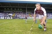 17 June 2006; Galway's Fergal Healy finishes tying his boots before the start of the match. Guinness All-Ireland Senior Hurling Championship Qualifier, Round 1, Laois v Galway, O'Moore Park, Portlaoise, Co. Laois. Picture credit: Brian Lawless / SPORTSFILE
