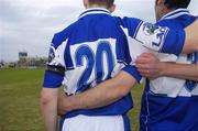 17 June 2006; Laois players wear black armbands and stand for a minutes silence in memory of Laois U21 player Jason Gilligan before the game. Guinness All-Ireland Senior Hurling Championship Qualifier, Round 1, Laois v Galway, O'Moore Park, Portlaoise, Co. Laois. Picture credit: Brian Lawless / SPORTSFILE
