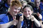 21 June 2006; Michael McCann and Ciara Brennan, from St Laserian's School, Co. Carlow, and representing the Leinster team, during the Opening ceremony of the 2006 Special Olympics Ireland games. Odyssey Arena, Belfast, Co. Antrim. Picture credit: Oliver McVeigh / SPORTSFILE