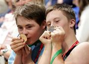 23 June 2006; Medal winners Ian McLoughlin, Declan Conelley from Bayside Dublin, Eastern Division, in action during the Level 2 Parallel bars event at the 2006 Special Olympics Ireland Games. Queens University, Belfast, Co. Antrim. Picture credit: Oliver McVeigh / SPORTSFILE