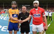 15 June 2014; Cork captain Patrick Cronin shakes hands with Clare captain Patrick Donnellan, with referee James McGrath before the game. Munster GAA Hurling Senior Championship, Semi-Final, Clare v Cork, Semple Stadium, Thurles, Co. Tipperary.