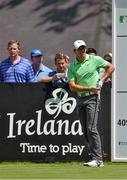 18 June 2014; Rory McIlroy watches his shot from the first tee box during the 2014 Irish Open Golf Championship Pro-Am. Fota Island, Cork. Picture credit: Diarmuid Greene / SPORTSFILE