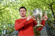 18 June 2014; Athlete Mark English with the Morton Mile Trophy during the launch of the Morton Games 2014. Buswell's Hotel, Kildare Street, Dublin. Picture credit: Pat Murphy / SPORTSFILE