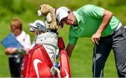 18 June 2014; Rory McIlroy reaches for an item in his golf bag during the 2014 Irish Open Golf Championship Pro-Am. Fota Island, Cork. Picture credit: Diarmuid Greene / SPORTSFILE