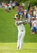 19 June 2014; Rory McIlroy watches his second shot from the tenth fairway during day 1 of the 2014 Irish Open Golf Championship. Fota Island, Cork. Picture credit: Matt Browne / SPORTSFILE