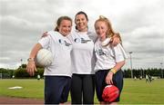 19 June 2014; Siobhan Earley, GPA, with Rebecca Scurry aged 13, from Dublin, and Stephanie Hendrick, aged 14, Ballymun, Dublin, in attendance at the annual GPA Community Camp in ALSAA, Dublin. The Camp, which is overseen by county players, is run for children from disadvantaged schools and this year is being run in conjunction with the SOAR organisation. ALSAA Sports Centre, Old Airport Road, Dublin. Picture credit: Barry Cregg / SPORTSFILE