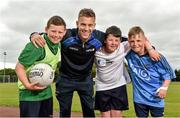 19 June 2014; Dublin footballer Jonny Cooper, with, left to right, Devin Maher, aged 13, Ciaran McDonald, aged 13, and Christopher Cahill, aged 13, all from Dublin City, in attendance at the annual GPA Community Camp in ALSAA, Dublin. The Camp, which is overseen by county players, is run for children from disadvantaged schools and this year is being run in conjunction with the SOAR organisation. ALSAA Sports Centre, Old Airport Road, Dublin. Picture credit: Barry Cregg / SPORTSFILE