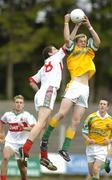 25 June 2006; Tomas Beirne, Leitrim, in action against Tom Parsons, Mayo. Connacht Minor Football Championship, Semi-Final, Leitrim v Mayo, Sean McDiarmuid Park, Carrick-on-Shannon, Co. Leitrim. Picture credit: Pat Murphy / SPORTSFILE