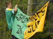 25 June 2006; A Leitrim fan places a banner on a fence behind the goal. Bank of Ireland Connacht Senior Football Championship, Semi-Final, Leitrim v Mayo, Sean McDiarmuid Park, Carrick-on-Shannon, Co. Leitrim. Picture credit: Pat Murphy / SPORTSFILE