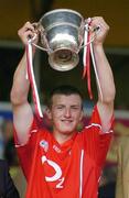 25 June 2006; Cork captain Patrick Horgan lifts the cup after the game. Munster Minor Hurling Championship Final, Tipperary v Cork, Semple Stadium, Thurles, Co. Tipperary. Picture credit: Brendan Moran / SPORTSFILE