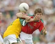 25 June 2006; Liam O'Malley, Mayo, in action against Michael Foley, Leitrim. Bank of Ireland Connacht Senior Football Championship, Semi-Final, Leitrim v Mayo, Sean McDiarmuid Park, Carrick-on-Shannon, Co. Leitrim. Picture credit: Pat Murphy / SPORTSFILE