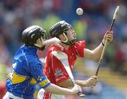 25 June 2006; Dan O'Callaghan, Cork, in action against Donagh Maher, Tipperary. Munster Minor Hurling Championship Final, Tipperary v Cork, Semple Stadium, Thurles, Co. Tipperary. Picture credit: Brendan Moran / SPORTSFILE