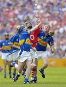 25 June 2006; Jerry O'Connor, Cork, in action against Paul Kelly, left, and Ger O'Grady, Tipperary. Guinness Munster Senior Hurling Championship Final, Tipperary v Cork, Semple Stadium, Thurles, Co. Tipperary. Picture credit: Brendan Moran / SPORTSFILE