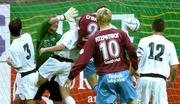 26 June 2006; Declan O'Brien, no.9, Drogheda United, beats Dublin City players, from left, Keith Doyle, goalkeeper Gary Rogers, Alan Kelly and Dave Freeman, to score his side's first goal. eircom League, Premier Division, Drogheda United v Dublin City, United Park, Drogheda, Co. Louth. Picture credit: David Maher / SPORTSFILE