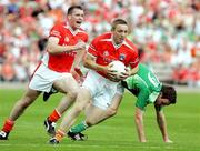 25 June 2006; Paul Duffy and Ciaran McKeever, Armagh. Bank of Ireland Ulster Senior Football Championship, Semi-Final Replay, Armagh v Fermanagh, St. Tighearnach's Park, Clones, Co. Monaghan. Picture credit: Oliver McVeigh / SPORTSFILE