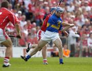 25 June 2006; Eoin Kelly, Tipperary, in action against Ronan Curran, Cork. Guinness Munster Senior Hurling Championship Final, Tipperary v Cork, Semple Stadium, Thurles, Co. Tipperary. Picture credit: Brendan Moran / SPORTSFILE