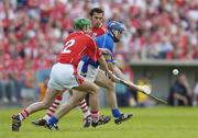 25 June 2006; Eoin Kelly, Tipperary, in action against Brian Murphy, left, and Sean Og O hAilpin, Cork. Guinness Munster Senior Hurling Championship Final, Tipperary v Cork, Semple Stadium, Thurles, Co. Tipperary. Picture credit: Brendan Moran / SPORTSFILE
