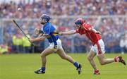 25 June 2006; Paul Kelly, Tipperary, in action against Cian O'Connor, Cork. Guinness Munster Senior Hurling Championship Final, Tipperary v Cork, Semple Stadium, Thurles, Co. Tipperary. Picture credit: Brendan Moran / SPORTSFILE