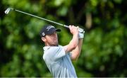 21 June 2014; Michael Hoey watches his tee shot off the third hole during day 3 of the 2014 Irish Open Golf Championship. Fota Island, Cork. Picture credit: Brendan Moran / SPORTSFILE