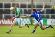 21 June 2014; Tommy McElroy, Fermanagh, in action against Colm Begley, Laois. GAA Football All-Ireland Senior Championship, Round 1A, Laois v Fermanagh, O’Moore Park, Portlaoise, Co. Laois. Picture credit: Pat Murphy / SPORTSFILE