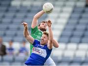 21 June 2014; Sean Quigley, Fermanagh, in action against Denis Booth, Laois. GAA Football All-Ireland Senior Championship, Round 1A, Laois v Fermanagh, O’Moore Park, Portlaoise, Co. Laois. Picture credit: Pat Murphy / SPORTSFILE