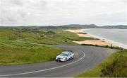 21 June 2014; Donagh Kelly and Kevin Flanagan, Ford Focus WRC, in action during SS 8 at the Donegal International Rally, Knockalla, Portsalon, Co. Donegal. Picture credit: Barry Cregg / SPORTSFILE