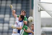 21 June 2014; Fermanagh's Sean Quigley contests a high ball with Laois goalkeeper Graham Brody which resulted in Fermanagh's first goal of the game. GAA Football All-Ireland Senior Championship, Round 1A, Laois v Fermanagh, O’Moore Park, Portlaoise, Co. Laois. Picture credit: Pat Murphy / SPORTSFILE