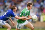 21 June 2014; Lee Cullen, Fermanagh, in action against Peter O'Leary, Laois. GAA Football All-Ireland Senior Championship, Round 1A, Laois v Fermanagh, O’Moore Park, Portlaoise, Co. Laois. Picture credit: Pat Murphy / SPORTSFILE