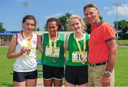 21 June 2014; Winner of the Girls 1500m event, Nadia Power, St. Mac Dara's CS, Co. Dublin, centre; second placed Rhona Pierce, Skerries CC, Co. Dublin, right; and third placed, Aoife McSheffrey, Limivady, GS, Co. Derry, left, with former World 5000m Champion Eamonn Coghlan. The 2014 Aviva Schools Tailteann Games. Morton Stadium, Santry, Dublin. Picture credit: Tomás Greally / SPORTSFILE