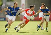 21 June 2014; Oisin Duffy, Derry, in action against Colm P Smyth and Paul Barden, Longford. GAA Football All-Ireland Senior Championship, Round 1A, Derry v Longford, Celtic Park, Derry. Picture credit: Oliver McVeigh / SPORTSFILE