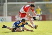 21 June 2014; Mark Lynch, Derry, in action against Kevin Diffley, Longford. GAA Football All-Ireland Senior Championship, Round 1A, Derry v Longford, Celtic Park, Derry. Picture credit: Oliver McVeigh / SPORTSFILE