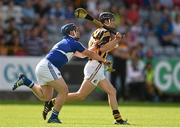 21 June 2014; Alan Murphy, Kilkenny, in action against Evan Cuddy, Laois. Electric Ireland Leinster Minor Hurling Championship, Semi-Final, Laois v Kilkenny, O'Moore Park, Portlaoise, Co. Laois. Picture credit: Pat Murphy / SPORTSFILE