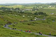 21 June 2013; A general view of the large crowd making their way from SS 8 at the Donegal International Rally, Knockalla, Portsalon, Co. Donegal. Picture credit: Barry Cregg / SPORTSFILE