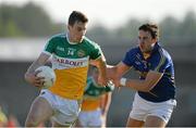 21 June 2014; Niall McNamee, Offaly, in action against Paul McLoughlin, Wicklow. GAA Football All-Ireland Senior Championship, Round 1A, Wicklow v Offaly, Aughrim GAA Grounds, Aughrim, Co. Wicklow. Picture credit: Dáire Brennan / SPORTSFILE