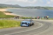 21 June 2014; Manus Kelly and Donal Barrett, Ford Escort, in action during SS10 at the Donegal International Rally, Knockalla, Portsalon, Co. Donegal. Picture credit: Barry Cregg / SPORTSFILE