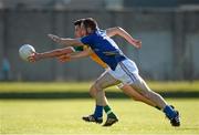 21 June 2014; Eoin Carroll, Offaly, in action against Patrick McWalter, Wicklow. GAA Football All-Ireland Senior Championship, Round 1A, Wicklow v Offaly, Aughrim GAA Grounds, Aughrim, Co. Wicklow. Picture credit: Dáire Brennan / SPORTSFILE
