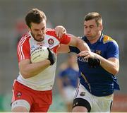 21 June 2014; Mark Lynch, Derry, in action against Kevin Diffley, Longford. GAA Football All-Ireland Senior Championship, Round 1A, Derry v Longford, Celtic Park, Derry. Picture credit: Oliver McVeigh / SPORTSFILE