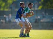 21 June 2014; Joe Maher, Offaly, in action against Kevin Murphy, Wicklow. GAA Football All-Ireland Senior Championship, Round 1A, Wicklow v Offaly, Aughrim GAA Grounds, Aughrim, Co. Wicklow. Picture credit: Dáire Brennan / SPORTSFILE