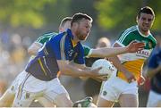 21 June 2014; Leighton Glynn, Wicklow, in action against Peter Cunningham, Offaly. GAA Football All-Ireland Senior Championship, Round 1A, Wicklow v Offaly, Aughrim GAA Grounds, Aughrim, Co. Wicklow. Picture credit: Dáire Brennan / SPORTSFILE
