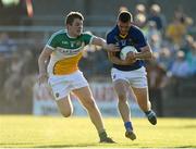 21 June 2014; Rory Finn, Wicklow, in action against Johnny Moloney, Offaly. GAA Football All-Ireland Senior Championship, Round 1A, Wicklow v Offaly, Aughrim GAA Grounds, Aughrim, Co. Wicklow. Picture credit: Dáire Brennan / SPORTSFILE