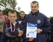 24 June 2006; Enda Smith, Boyle Celtic captain, is presented with a team certificate by Republic of Ireland goalkeeper Shay Given after the Danone Nations Cup. AUL Complex, Clonshaugh, Dublin. Picture credit: Pat Murphy / SPORTSFILE
