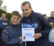 24 June 2006; Dylan Loughney, Home Farm captain, is presented with a team certificate by Republic of Ireland goalkeeper Shay Given after the Danone Nations Cup. AUL Complex, Clonshaugh, Dublin. Picture credit: Pat Murphy / SPORTSFILE